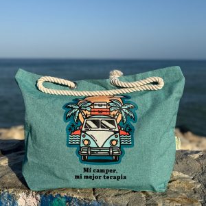 Bolso de playa camper turquesa de algodón reciclado con asas largas trenzadas y diseño natural