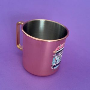 Vista cenital de la Taza Camper Glow de acero inoxidable 480 ml con recubrimiento oro rosa y asa dorada cuadrada